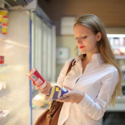 Undecided girl at the supermarket