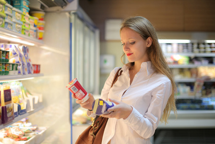 Undecided girl at the supermarket