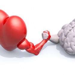 heart and brain arm wrestling