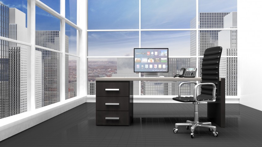 Interior of a modern office with window and cityscape view