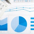 Accounting concept: pen, calculator and paperwork