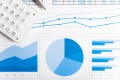 Accounting concept: pen, calculator and paperwork