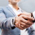 Handshake of businessmen greeting each other