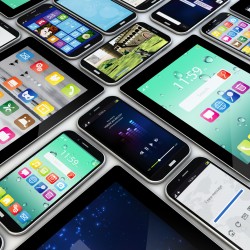 applications concept: a group of mobile devices with apps on the screens