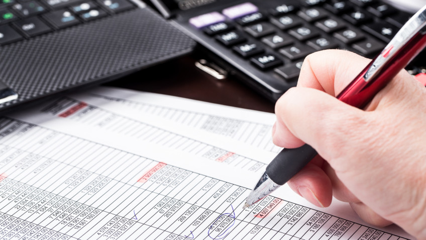 Business woman working with documents in the office