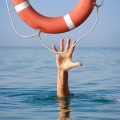 Lifebuoy for drowning man in sea or ocean water