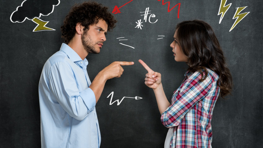 Discussion Between Guy And Girl Over Gray Background