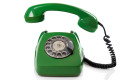 Green retro telephone on white background