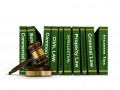 Row of Law Books and Wooden Gavel