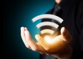 Wifi technology symbol in businessman hand