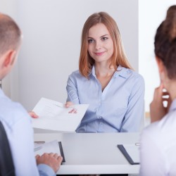 Young pretty woman and the begining of her job interview