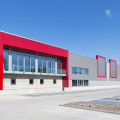 newly build modern red office building with warehouse